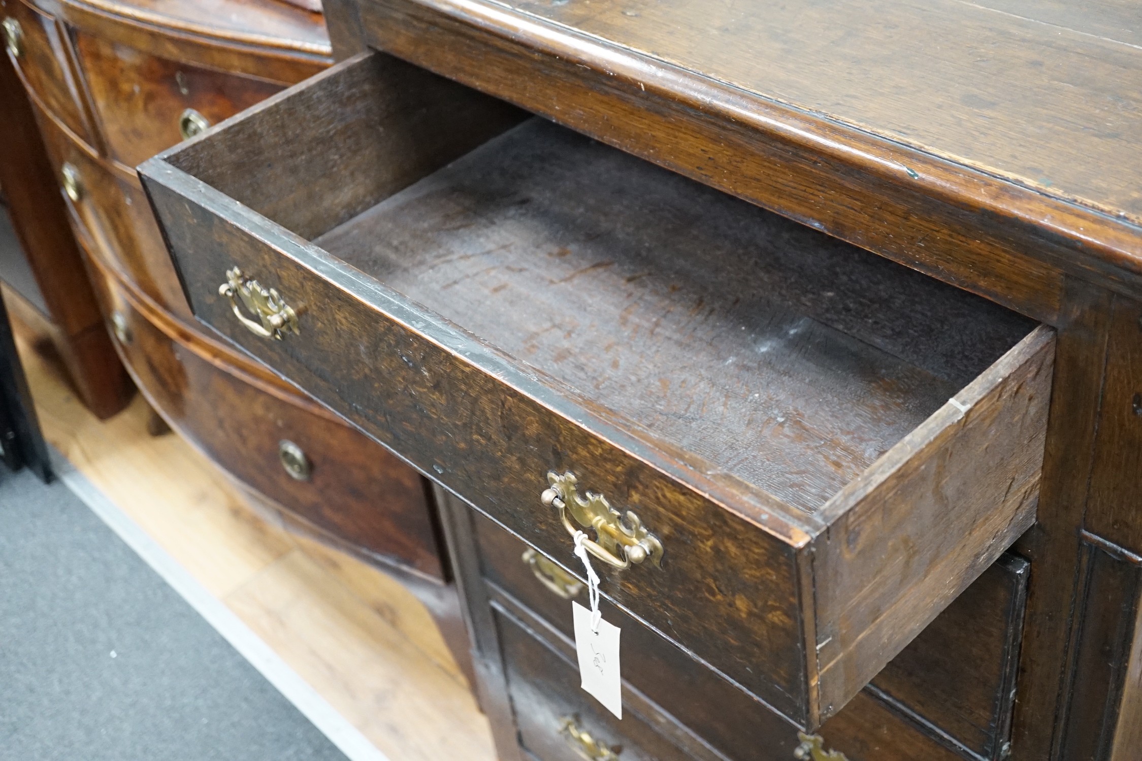 An 18th century style oak four drawer chest, width 75cm *Please note the sale commences at 9am.